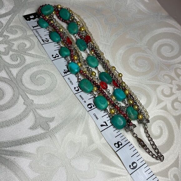 Multi-strand faux turquoise, red, yellow pearl, and neutral tone necklace - Picture 9 of 10